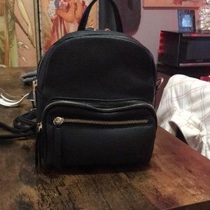 Mini black backpack